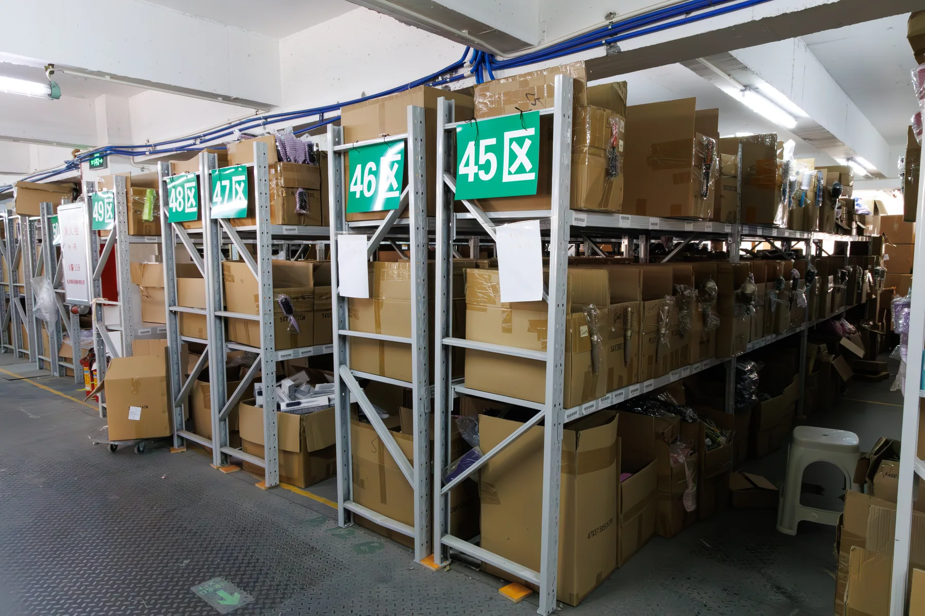 Numbered storage racks and cartons at the BOFEI factory